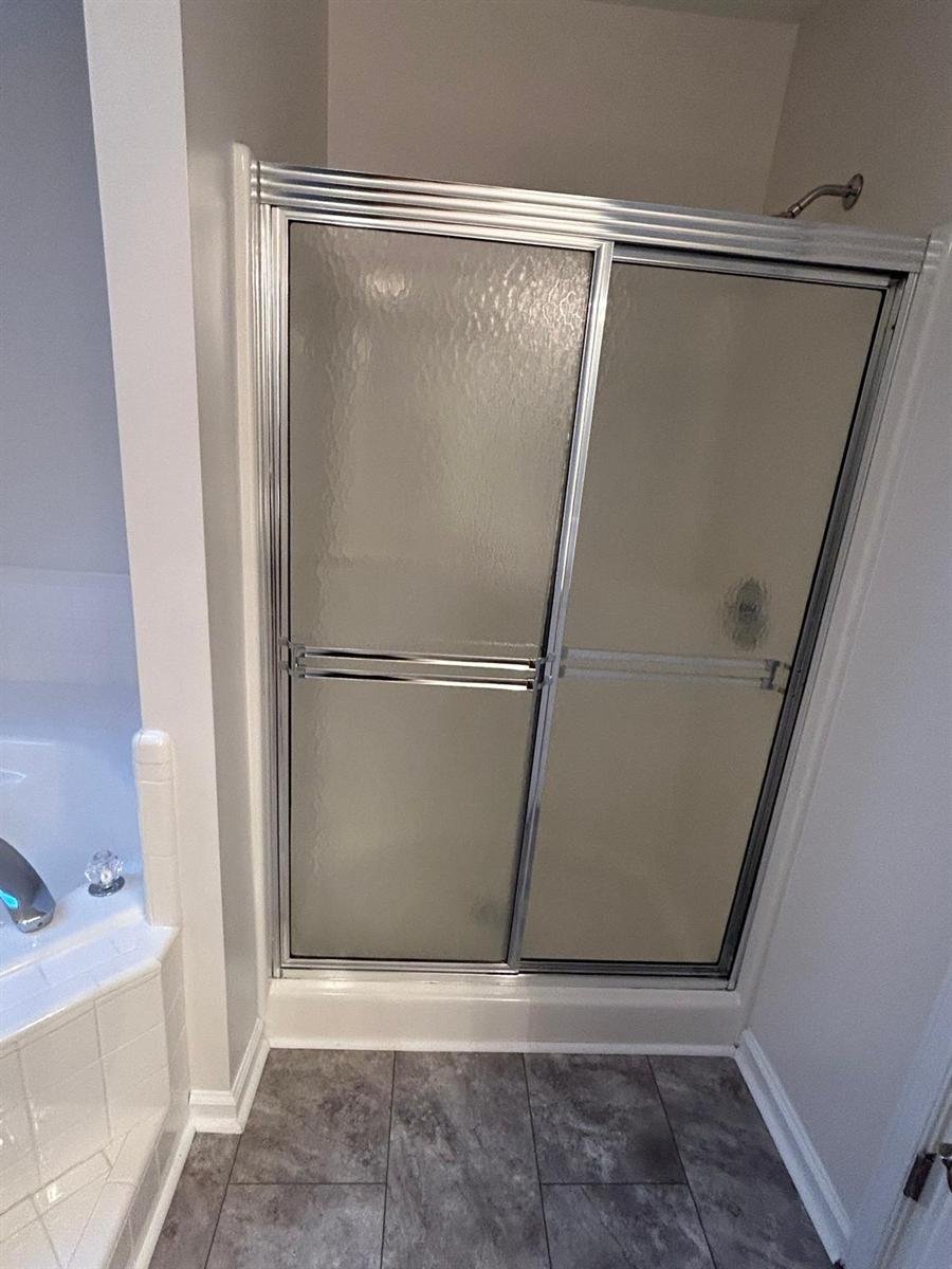 Sliding glass shower doors left streak free